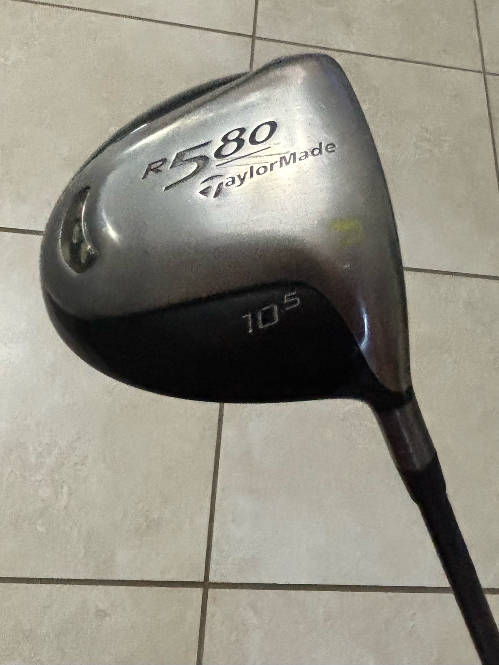 Taylor made R580 10.5” Driver/titanium composite head w/ a silver&black finish